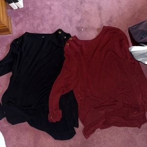 Pair of matching sweaters.